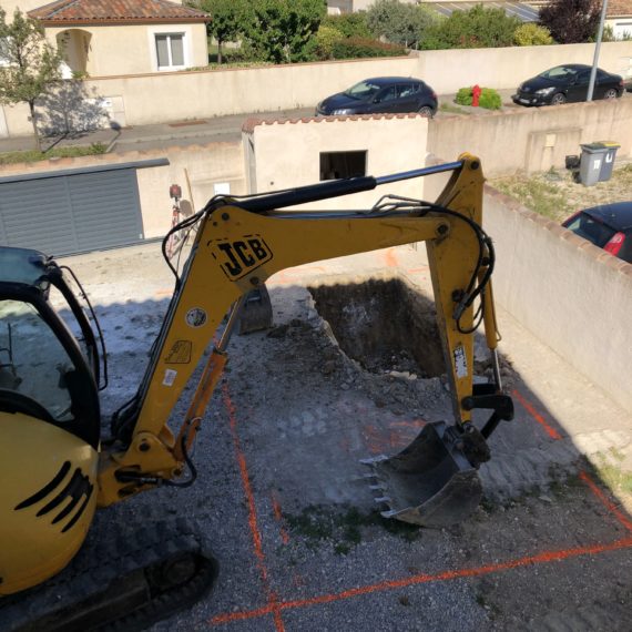 Terrassement et pose de coque de piscine