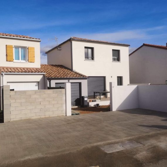 Terrassement et réalisation de dallage en béton balayé